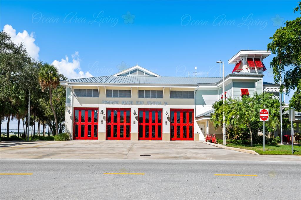 251 South Cypress Road, Unit 120 Pompano Beach, FL 33060 - Photo 34 of 42 a view of a building with a street