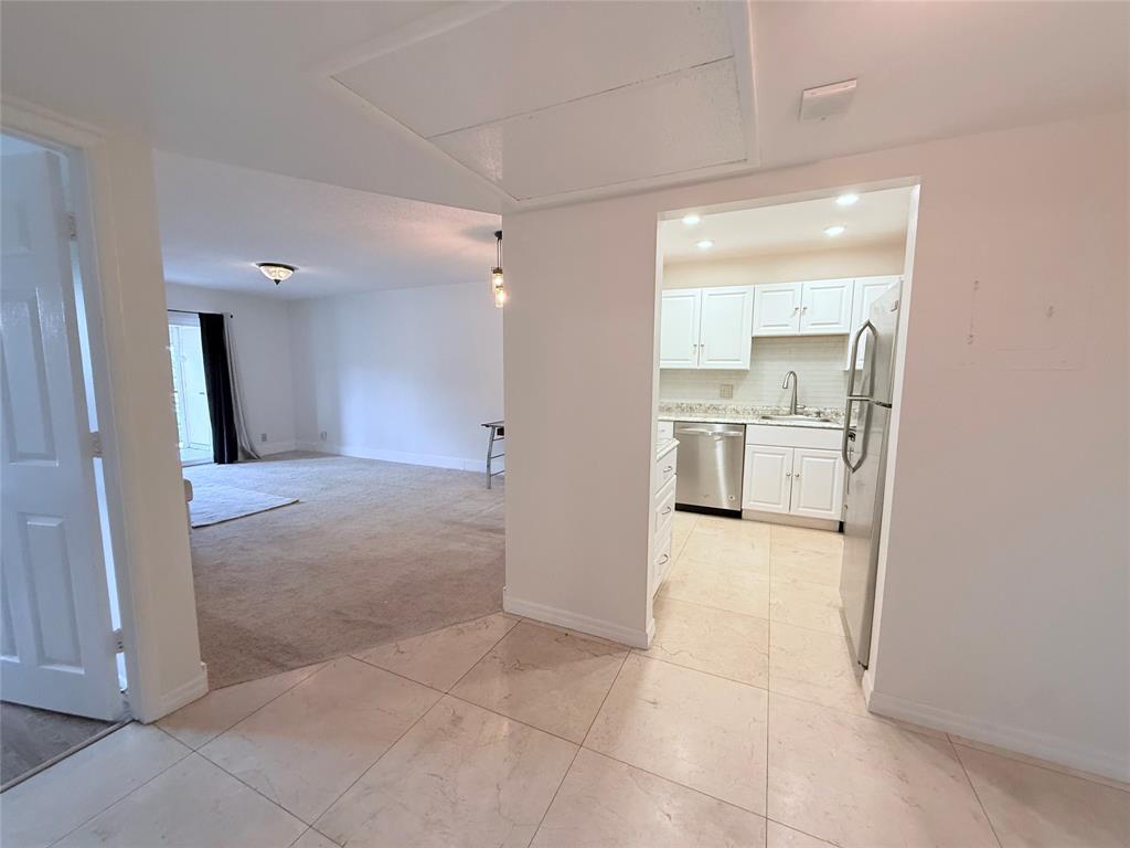251 South Cypress Road, Unit 120 Pompano Beach, FL 33060 - Photo 4 of 42 a view of a kitchen cabinets and a kitchen