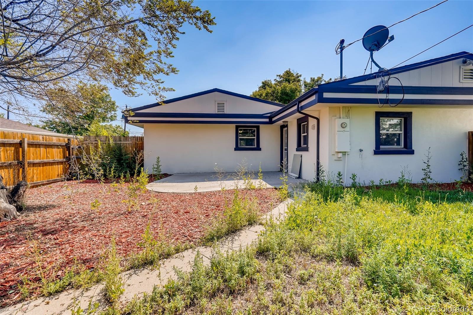 5535 Tejon Street Denver, CO 80221 - Photo 20 of 23 a view of house with yard and entertaining space