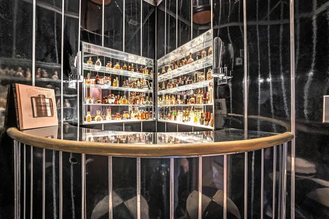 a bathroom with a shower and a sink