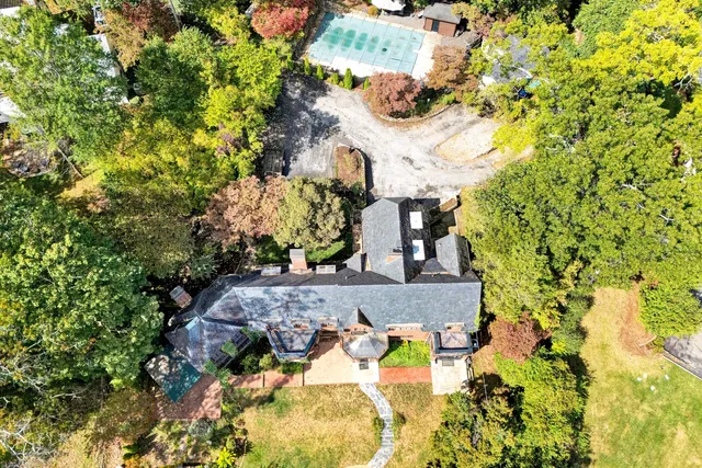 a view of a house with a yard balcony