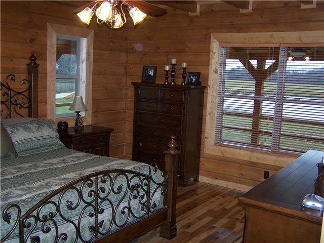 389 North Scenic Road Monteagle, TN 37356 - Photo 9 of 12 Windows open to porches and views of ponds for private bird watching!