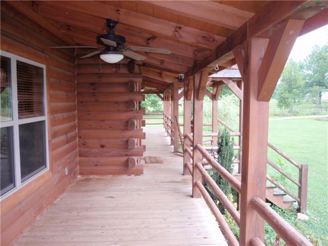 389 North Scenic Road Monteagle, TN 37356 - Photo 10 of 12 View of front porch from just one of the front corners - so much room for relaxing!