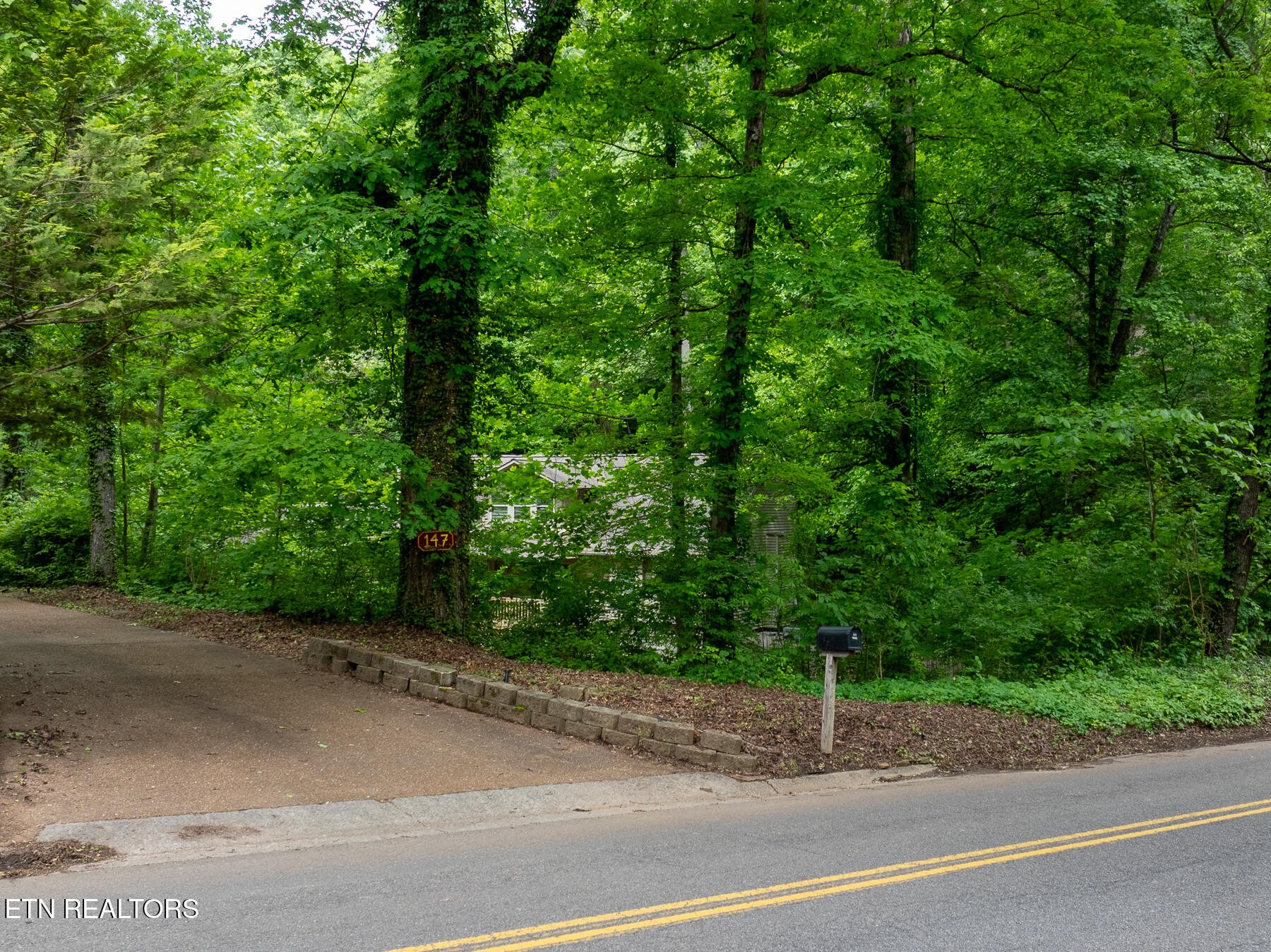 147 California Avenue Oak Ridge, TN 37830 - Photo 2 of 39 a view of a roadside