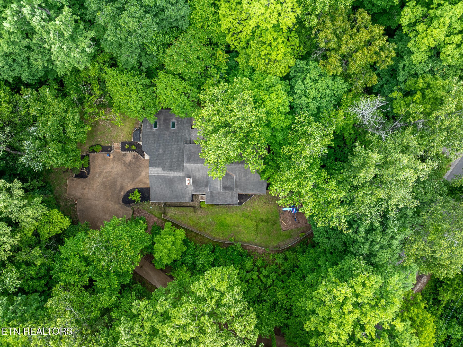147 California Avenue Oak Ridge, TN 37830 - Photo 8 of 39 an aerial view of a house with a yard and lake view
