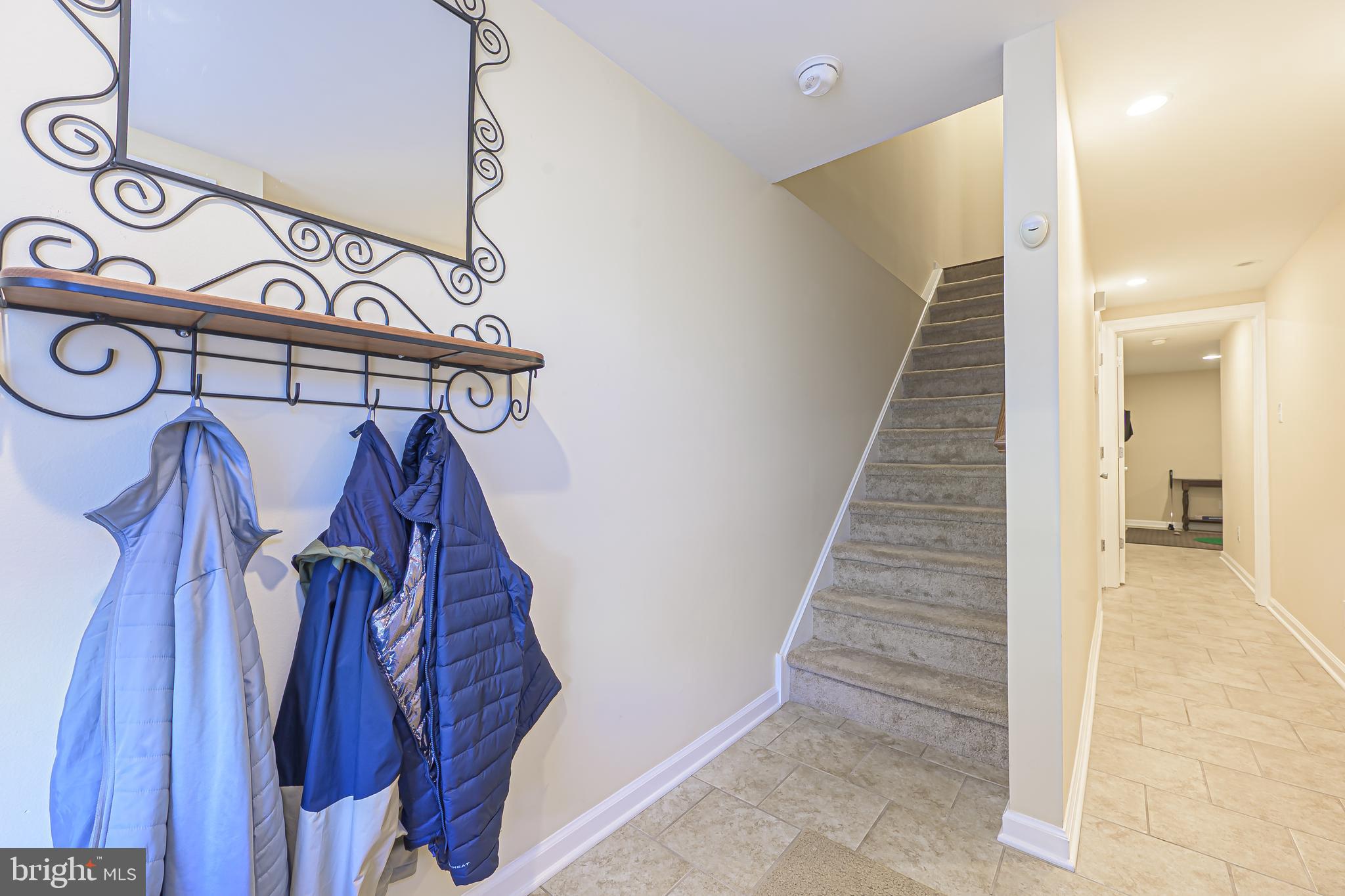 22 Millstream Road Pine Hill, NJ 08021 - Photo 4 of 28 a view of a hallway with stairs