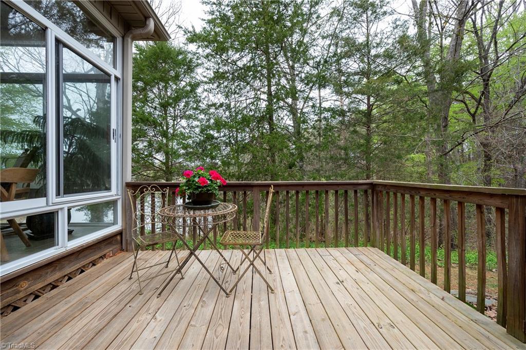 258 Sparks Road Advance, NC 27006 - Photo 18 of 39 deck off of sunroom