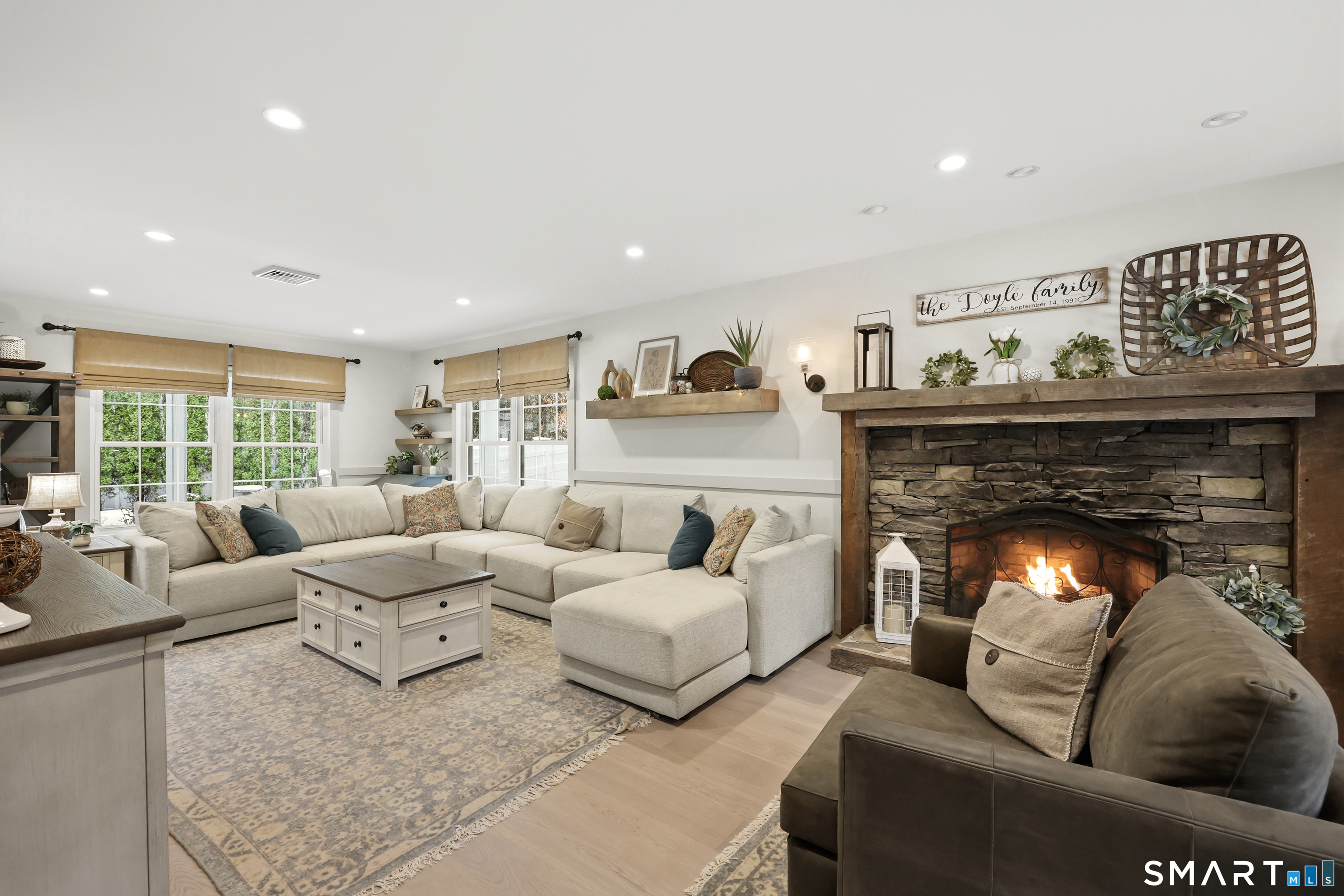 35 Quail Run Harwinton, CT 06791 - Photo 11 of 40 a living room with furniture and a fireplace