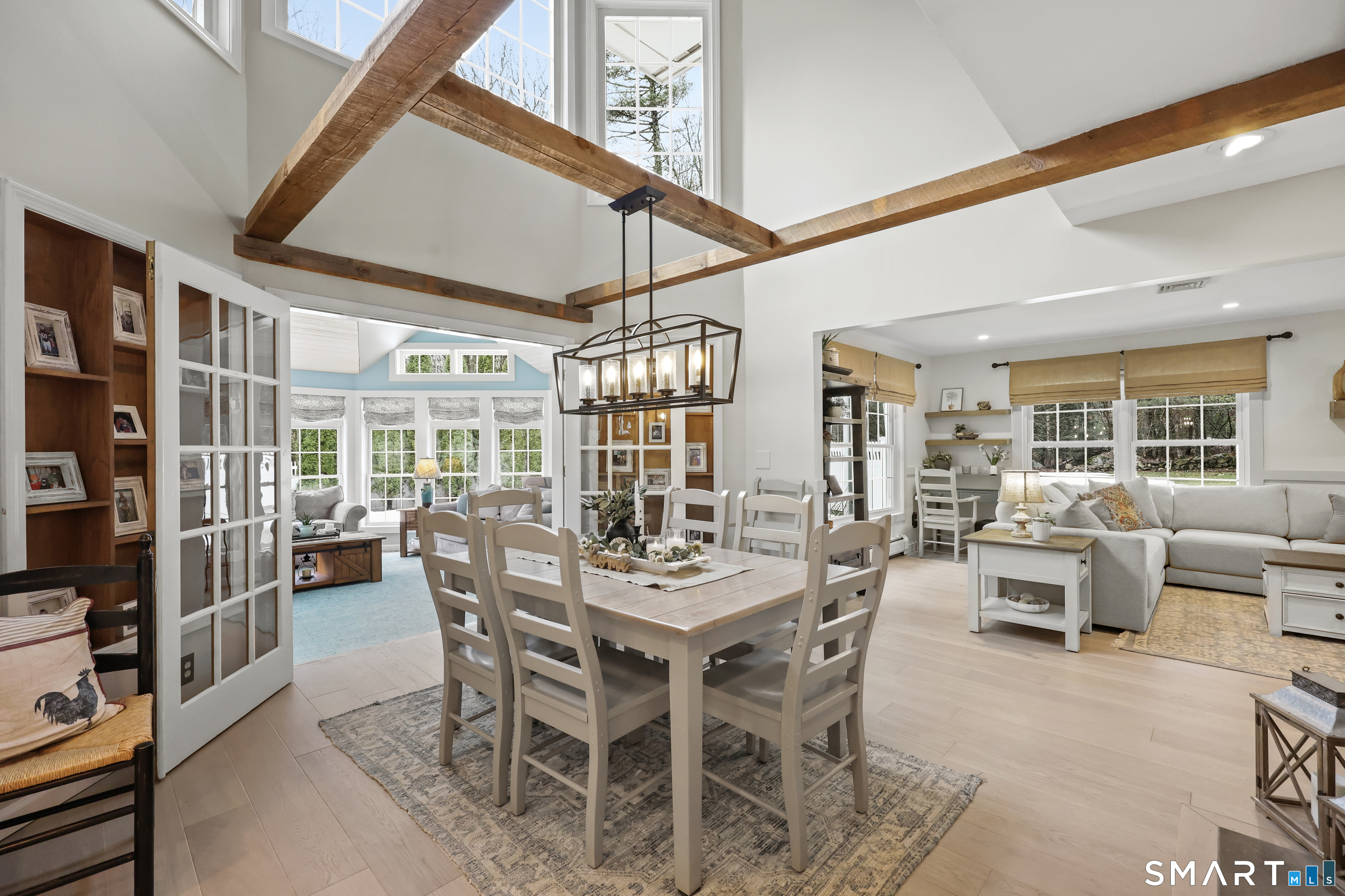 35 Quail Run Harwinton, CT 06791 - Photo 14 of 40 a view of a dining room with furniture window and outside view