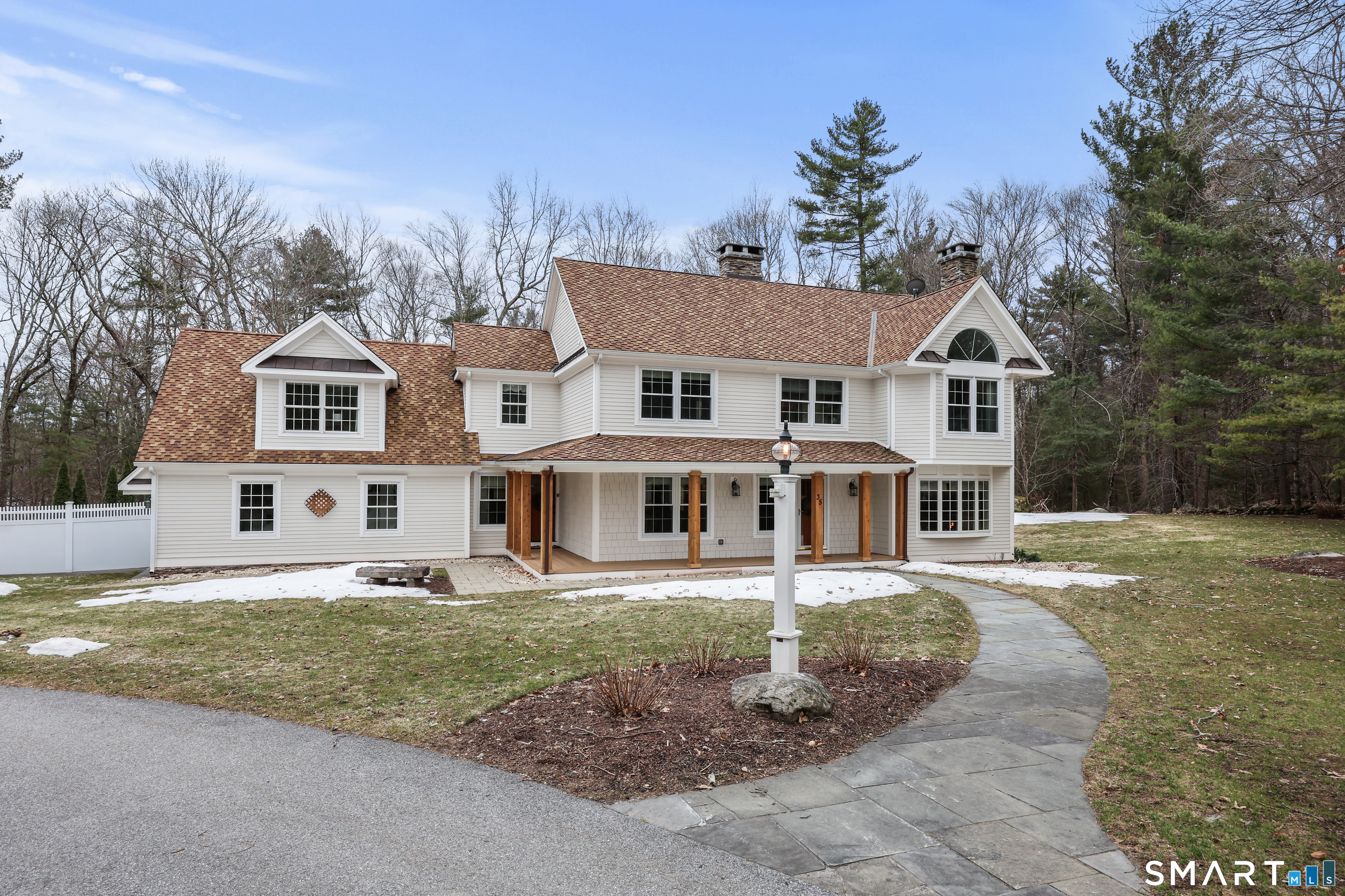 35 Quail Run Harwinton, CT 06791 - Photo 2 of 40 front view of a house with a patio
