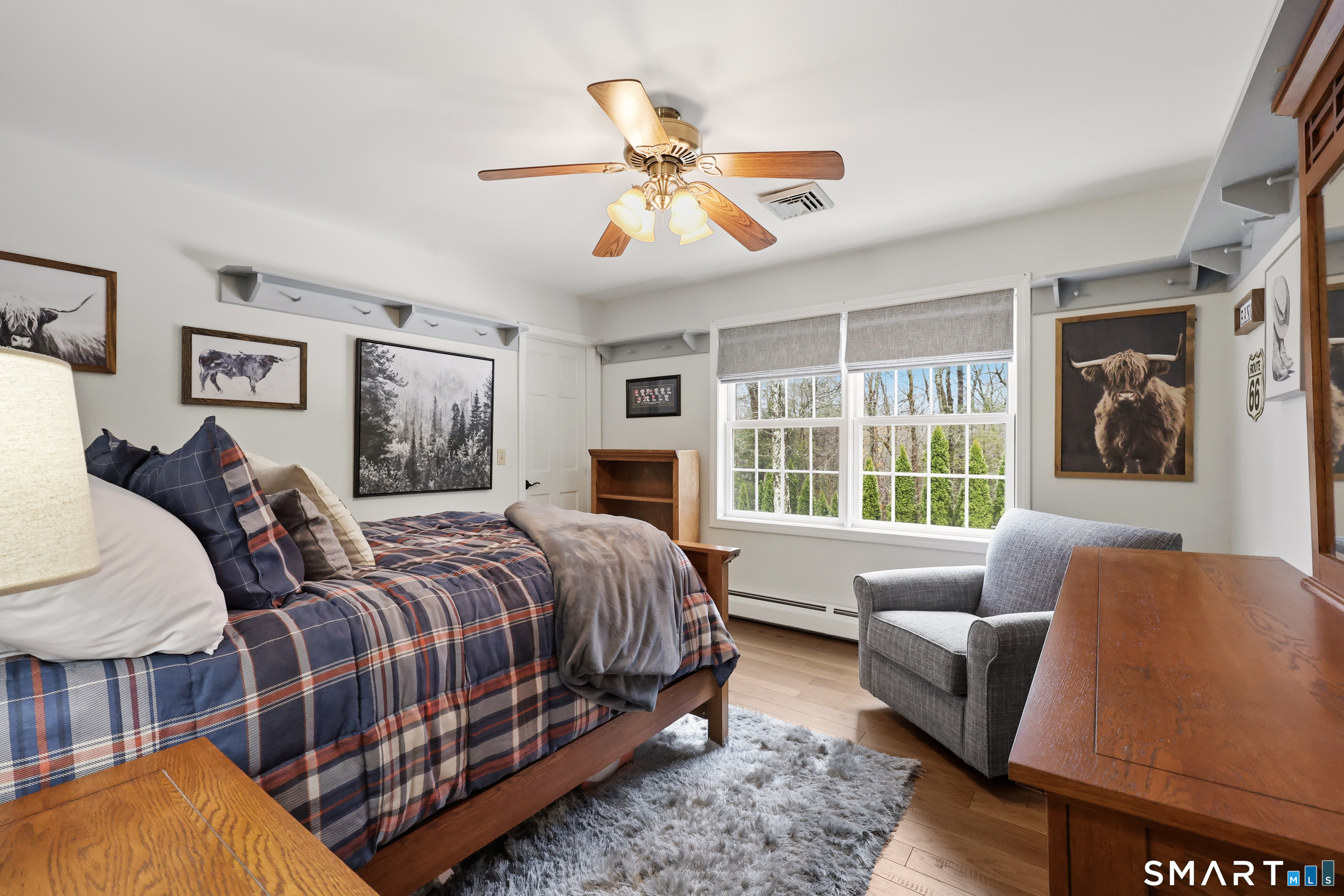 35 Quail Run Harwinton, CT 06791 - Photo 29 of 40 a bed room with a bed couch and a window