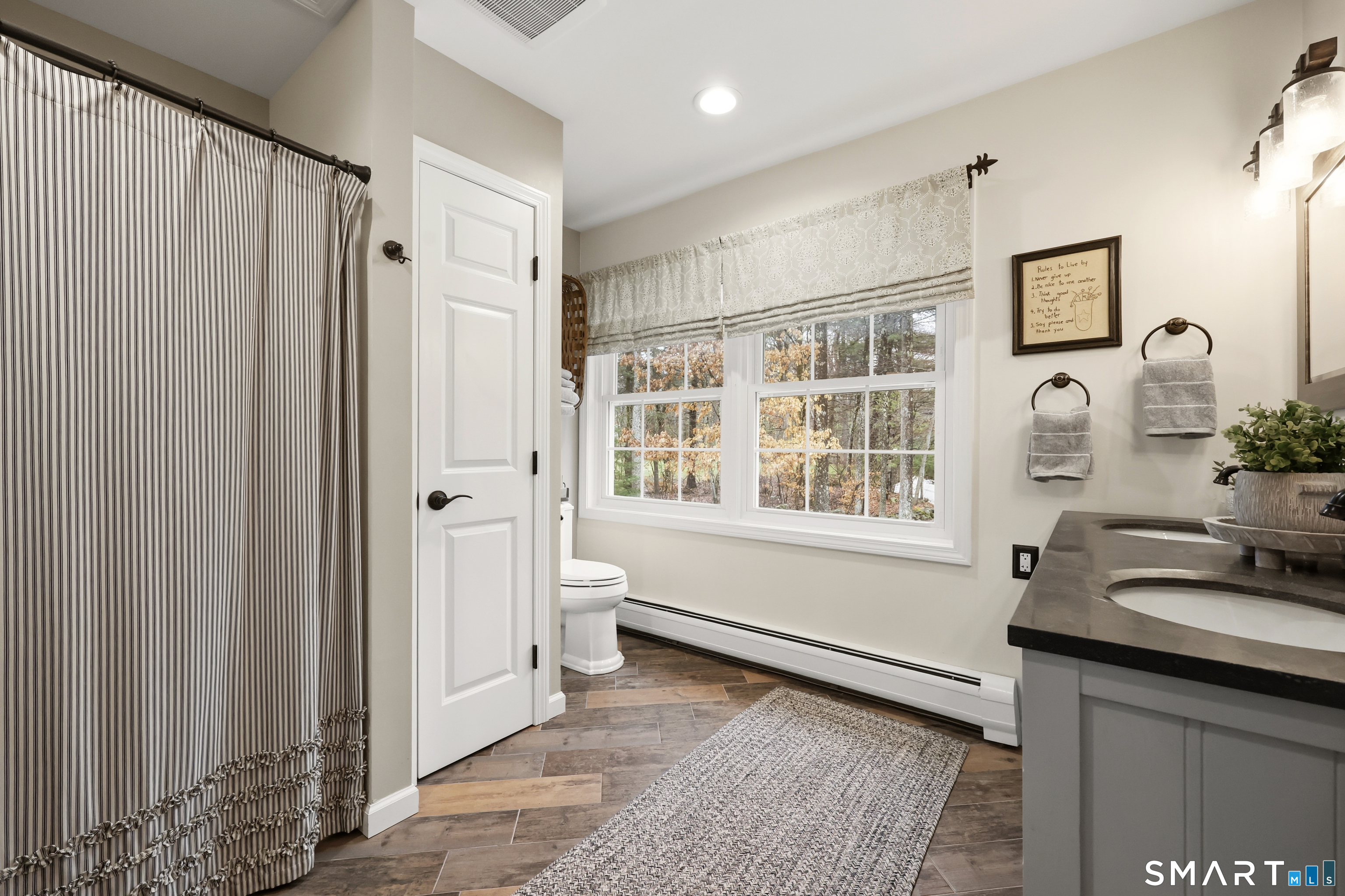 35 Quail Run Harwinton, CT 06791 - Photo 34 of 40 a bathroom with a bathtub and a shower