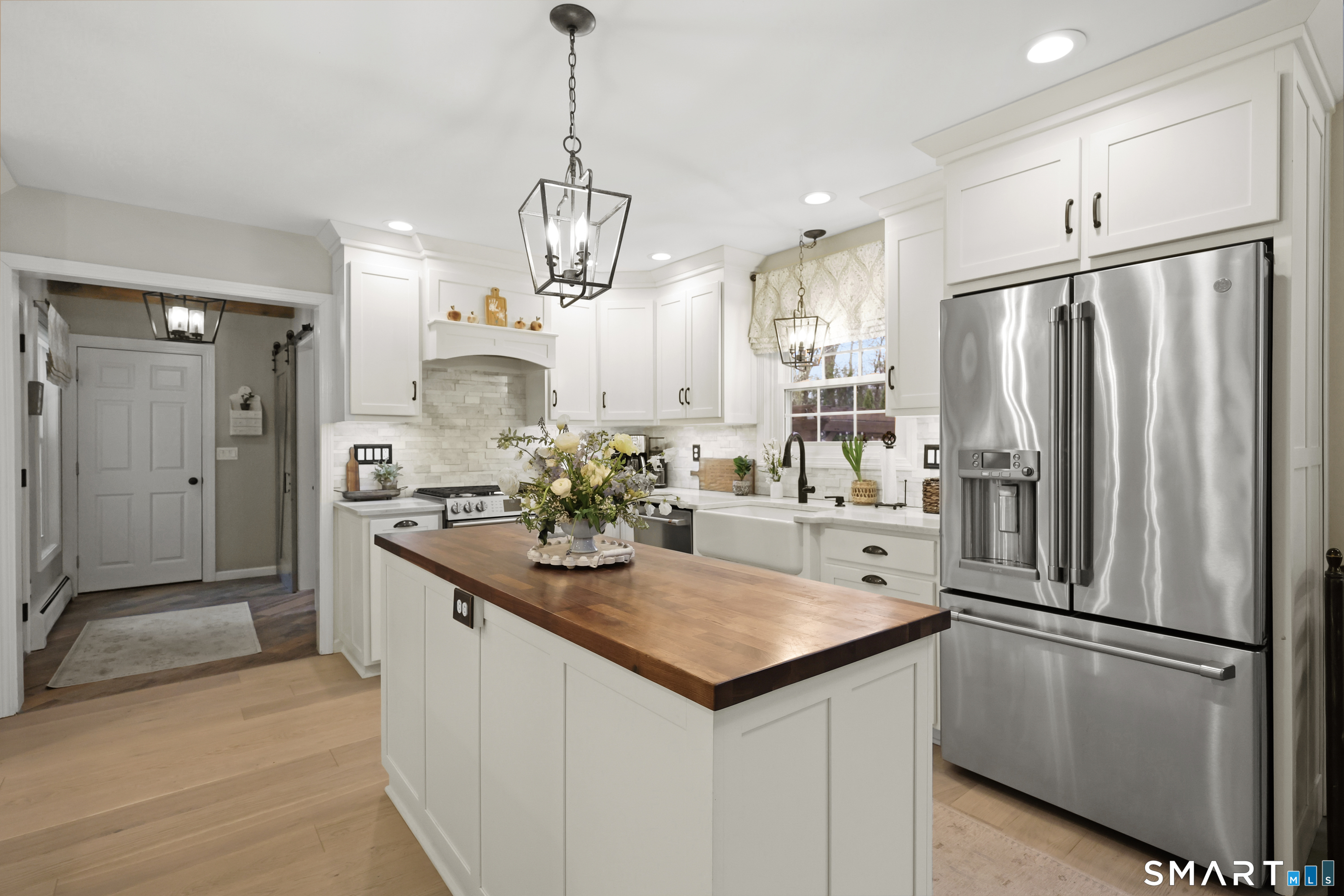 35 Quail Run Harwinton, CT 06791 - Photo 9 of 40 a kitchen with stainless steel appliances a refrigerator a sink and a refrigerator