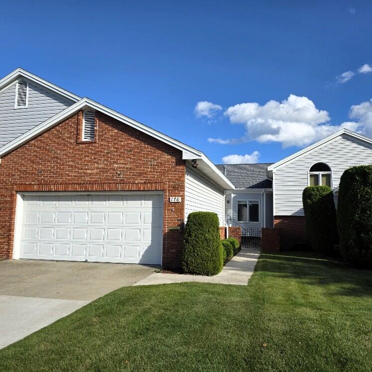 176 Long Rapids Road Alpena, MI 49707 - Photo 2 of 38 Front of Condo