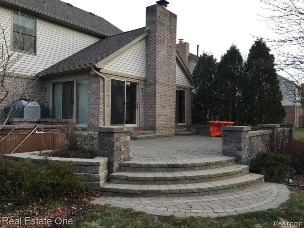 1600 Dunston Road Canton, MI 48188 - Photo 7 of 39 Newer Sand Stone Patio and Landscaping, Over $40K.