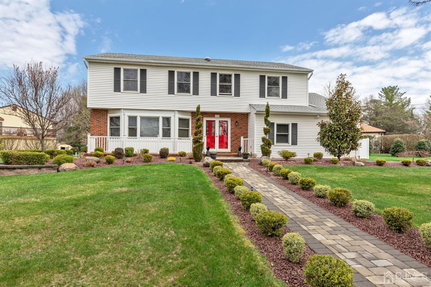28 Harkins Road Milltown, NJ 08850 - Photo 1 of 46 a front view of house with yard and green space