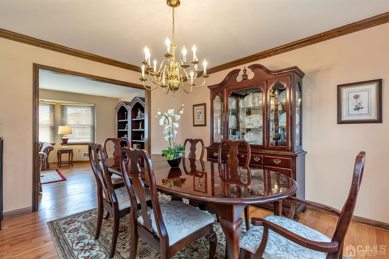 28 Harkins Road Milltown, NJ 08850 - Photo 11 of 46 a view of a dining room with furniture and wooden floor