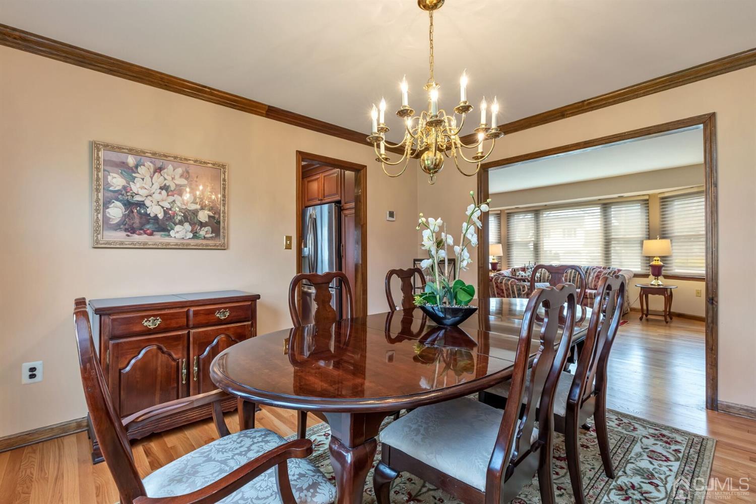 28 Harkins Road Milltown, NJ 08850 - Photo 12 of 46 a view of a dining room with furniture window and wooden floor