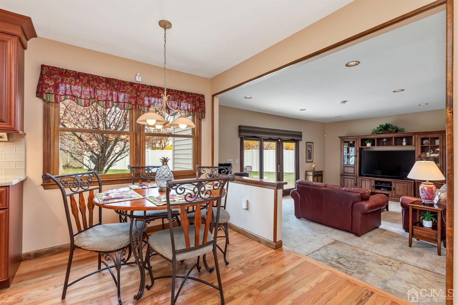 28 Harkins Road Milltown, NJ 08850 - Photo 17 of 46 a view of a livingroom with furniture window and wooden floor