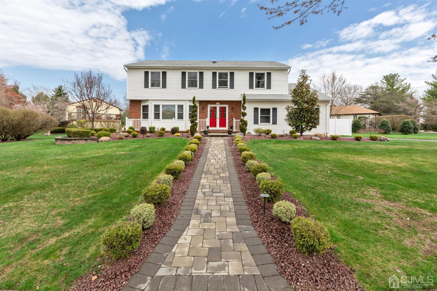 28 Harkins Road Milltown, NJ 08850 - Photo 3 of 46 a front view of house with yard and green space