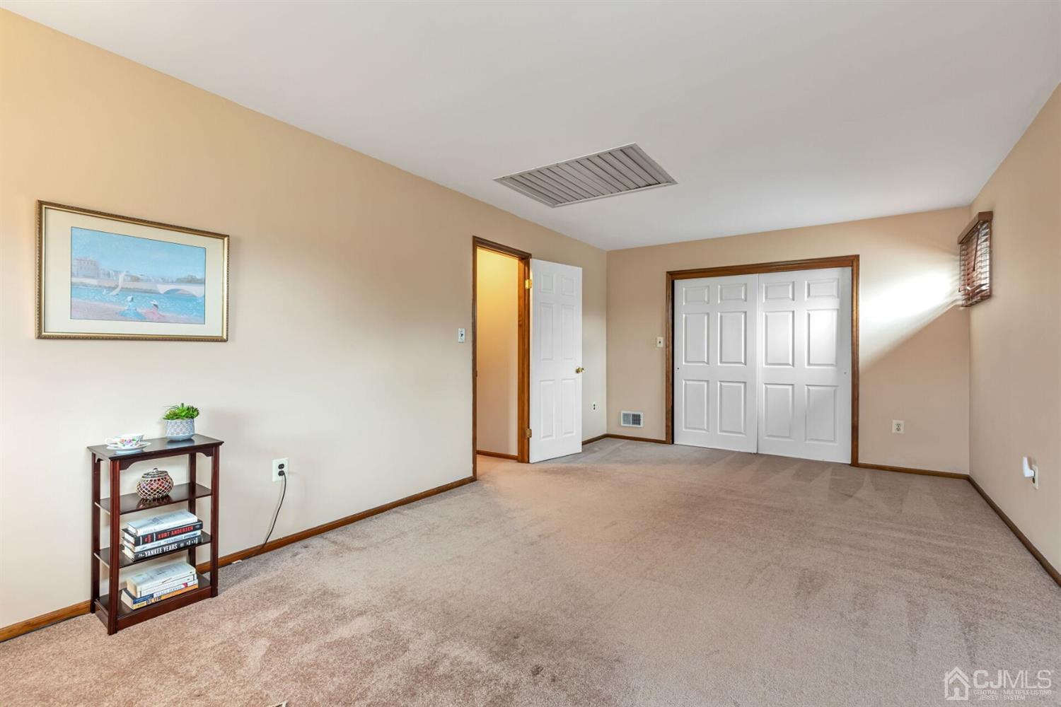 28 Harkins Road Milltown, NJ 08850 - Photo 33 of 46 an empty room with windows