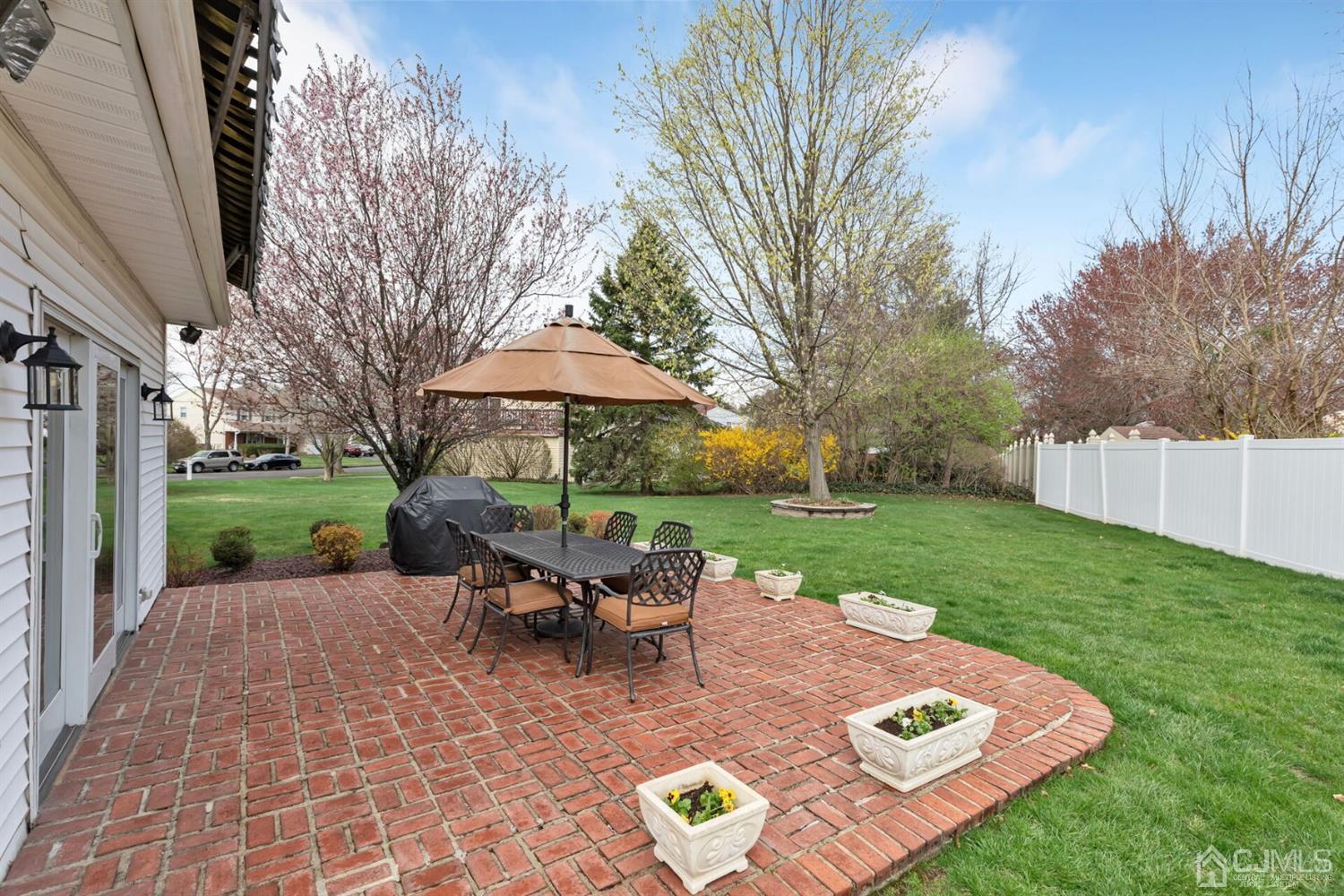 28 Harkins Road Milltown, NJ 08850 - Photo 39 of 46 a view of a backyard with a garden and furniture