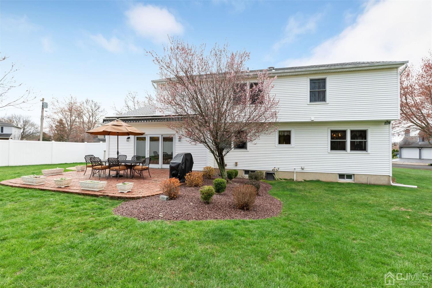 28 Harkins Road Milltown, NJ 08850 - Photo 42 of 46 a view of a house with backyard and sitting area
