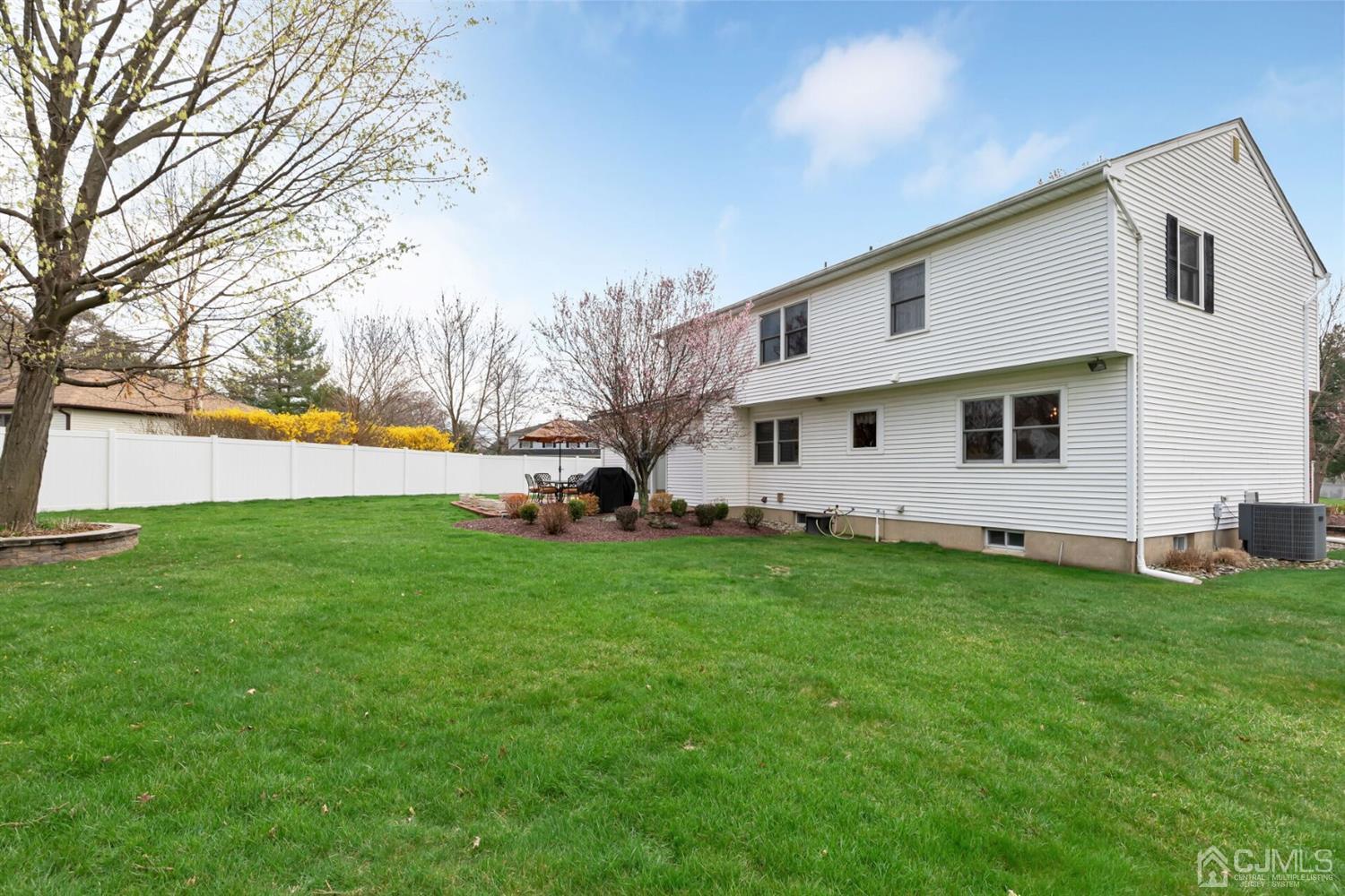 28 Harkins Road Milltown, NJ 08850 - Photo 43 of 46 a view of a back yard of the house