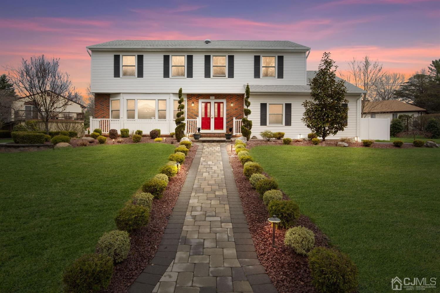 28 Harkins Road Milltown, NJ 08850 - Photo 45 of 46 a view of a house with backyard and garden