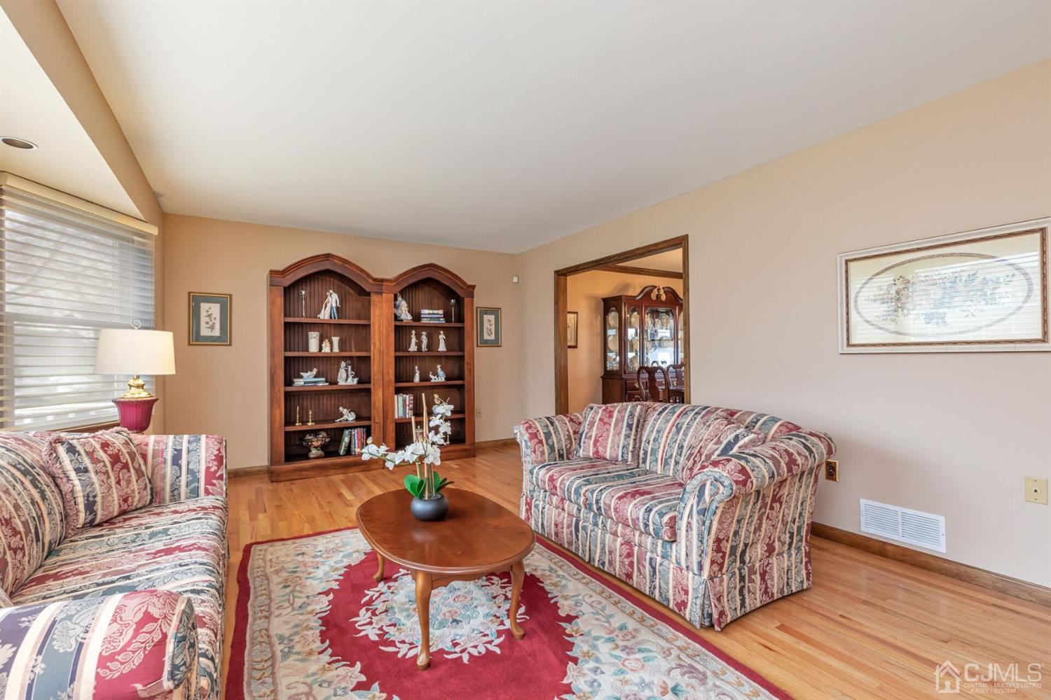 28 Harkins Road Milltown, NJ 08850 - Photo 8 of 46 a living room with furniture and wooden floor