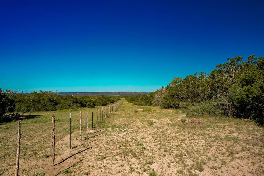 16 Jack Rabbit Road, Unit 16 Doss, TX 78618 - Photo 4 of 23 a view of lake with mountain