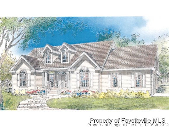 6816 Maxwell Road Stedman, NC 28391 - Photo 1 of 1 a front view of a house with a garden and pathway