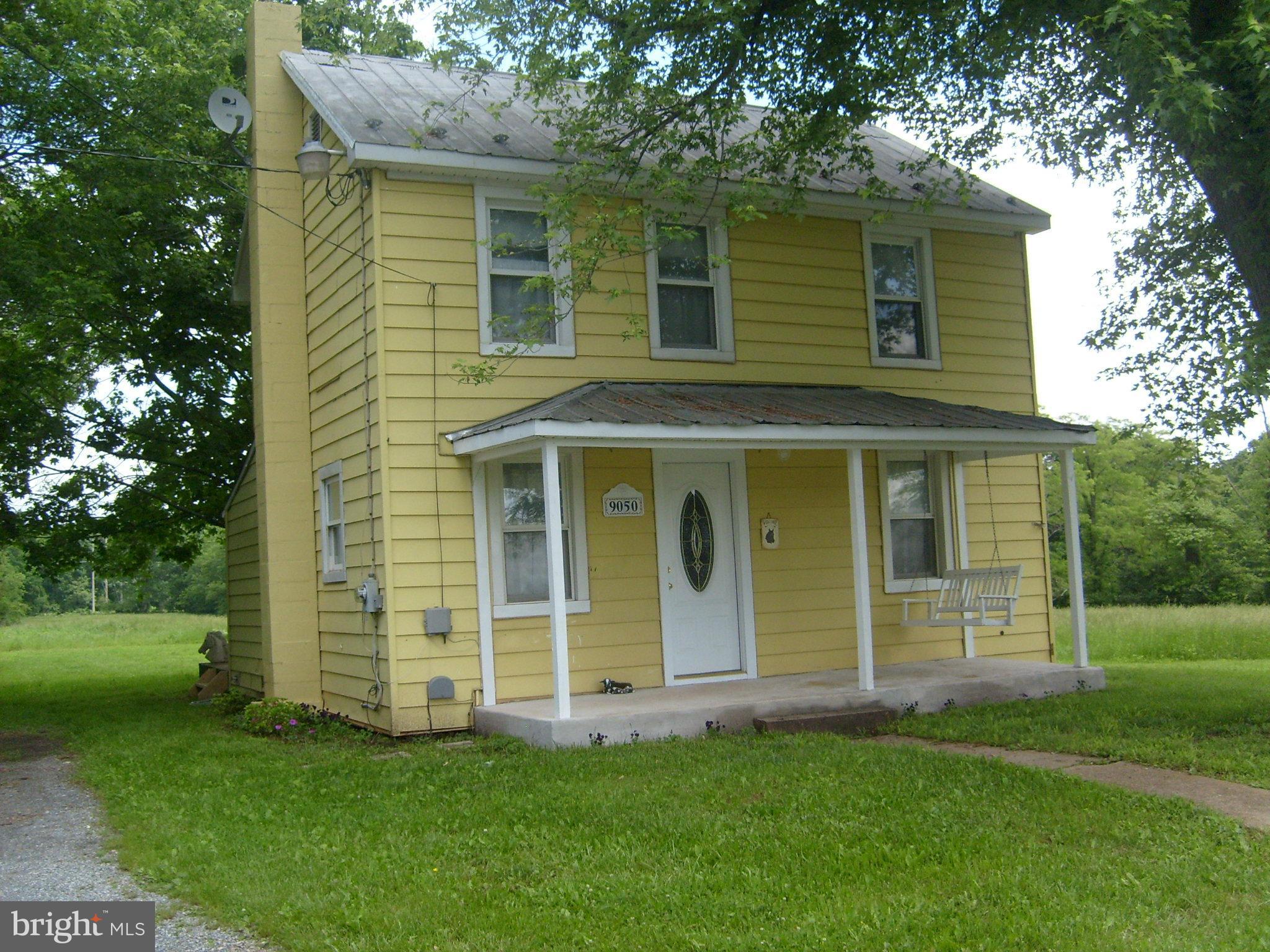 9050 New Cut Road Rocky Ridge, MD 21778 - Photo 1 of 24 a view of a house with a garden