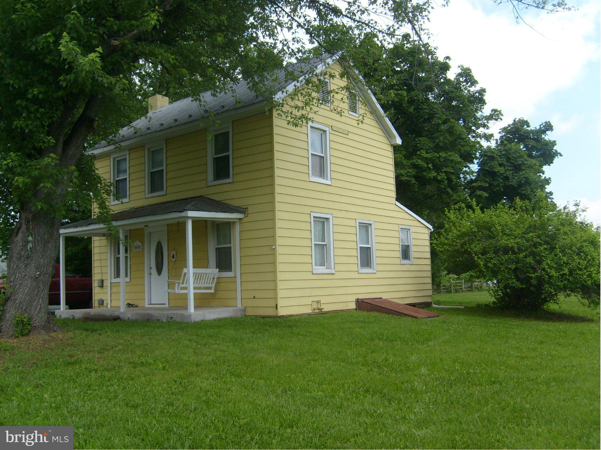 9050 New Cut Road Rocky Ridge, MD 21778 - Photo 19 of 24 a view of a house with a yard