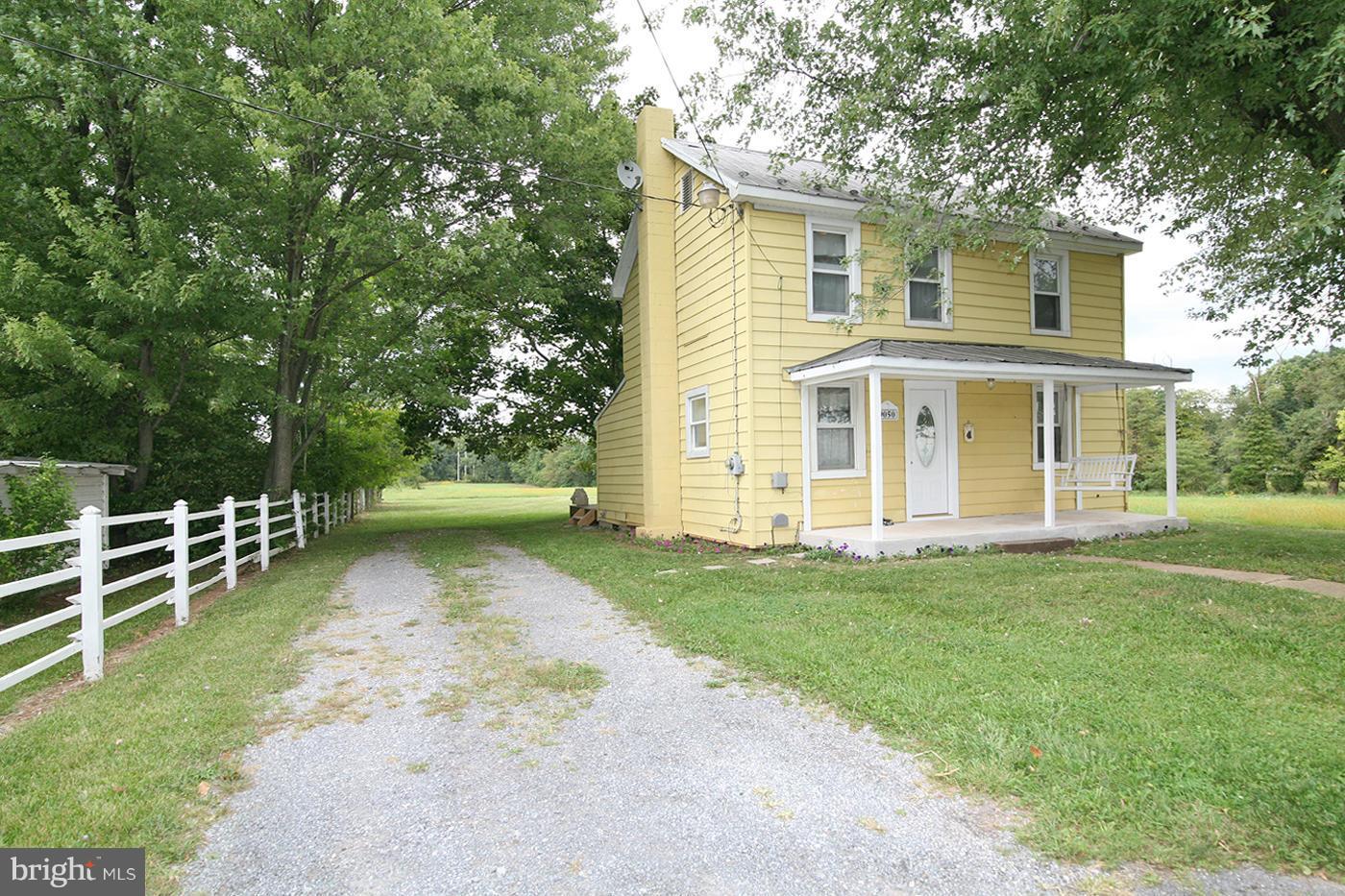 9050 New Cut Road Rocky Ridge, MD 21778 - Photo 20 of 24 a view of a house with a backyard