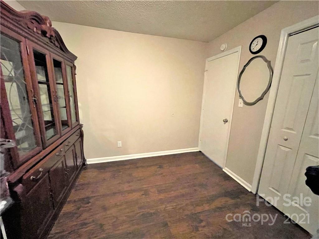 7002 Ware Road Charlotte, NC 28212 - Photo 20 of 21 a view of a hallway with painted walls