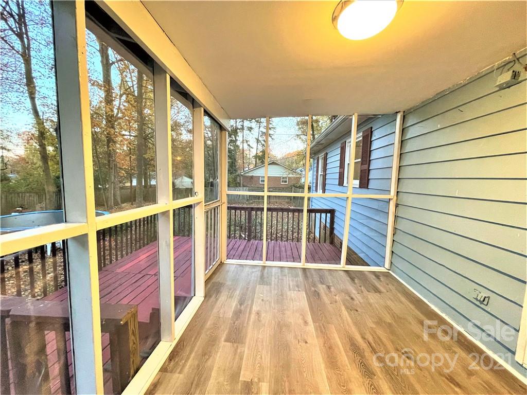 7002 Ware Road Charlotte, NC 28212 - Photo 5 of 21 a view of a balcony with wooden floor