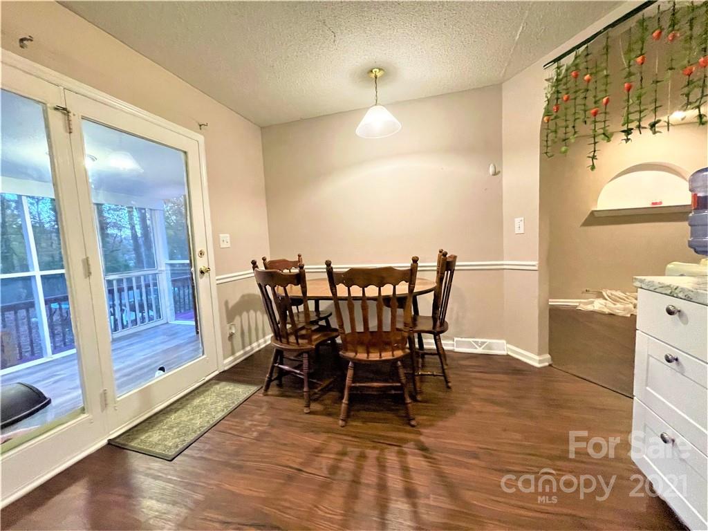 7002 Ware Road Charlotte, NC 28212 - Photo 8 of 21 a view of a dining room with furniture