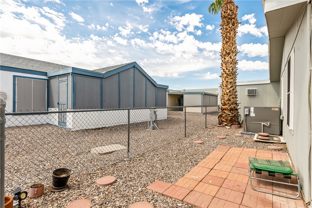 1545 East El Rodeo Road, Unit 58 Fort Mohave, AZ 86426 - Photo 42 of 47 View of yard featuring a patio