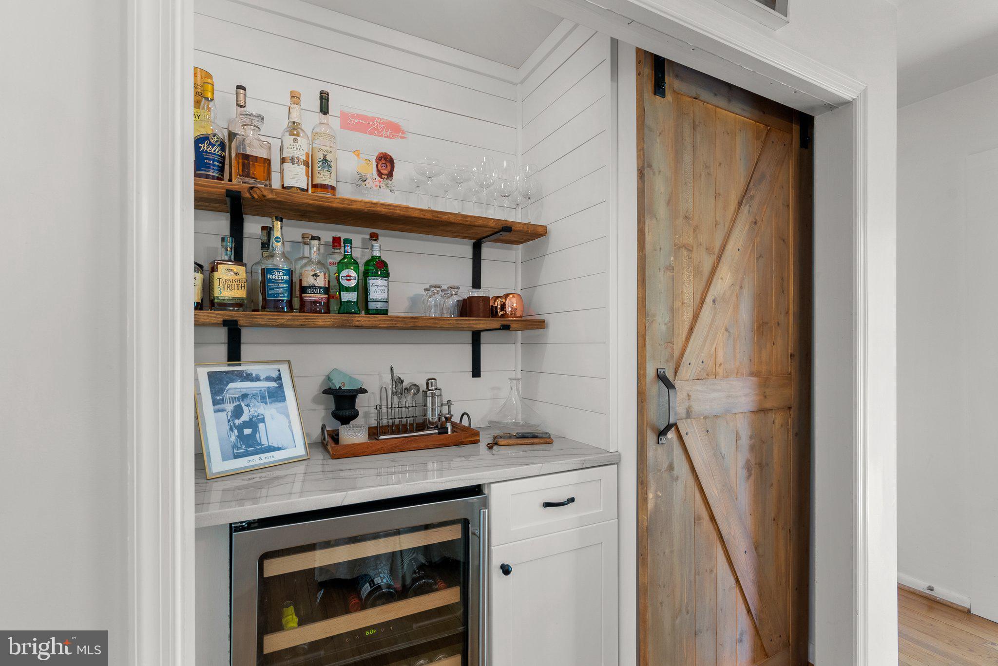 19617 Charline Manor Road Olney, MD 20832 - Photo 17 of 54 Lighted alcove w/fridge & pantry behind barn door