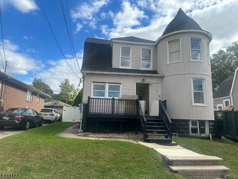 88 Hornsby Street Woodbridge, NJ 08863 - Photo 12 of 12 a view of a house with a yard