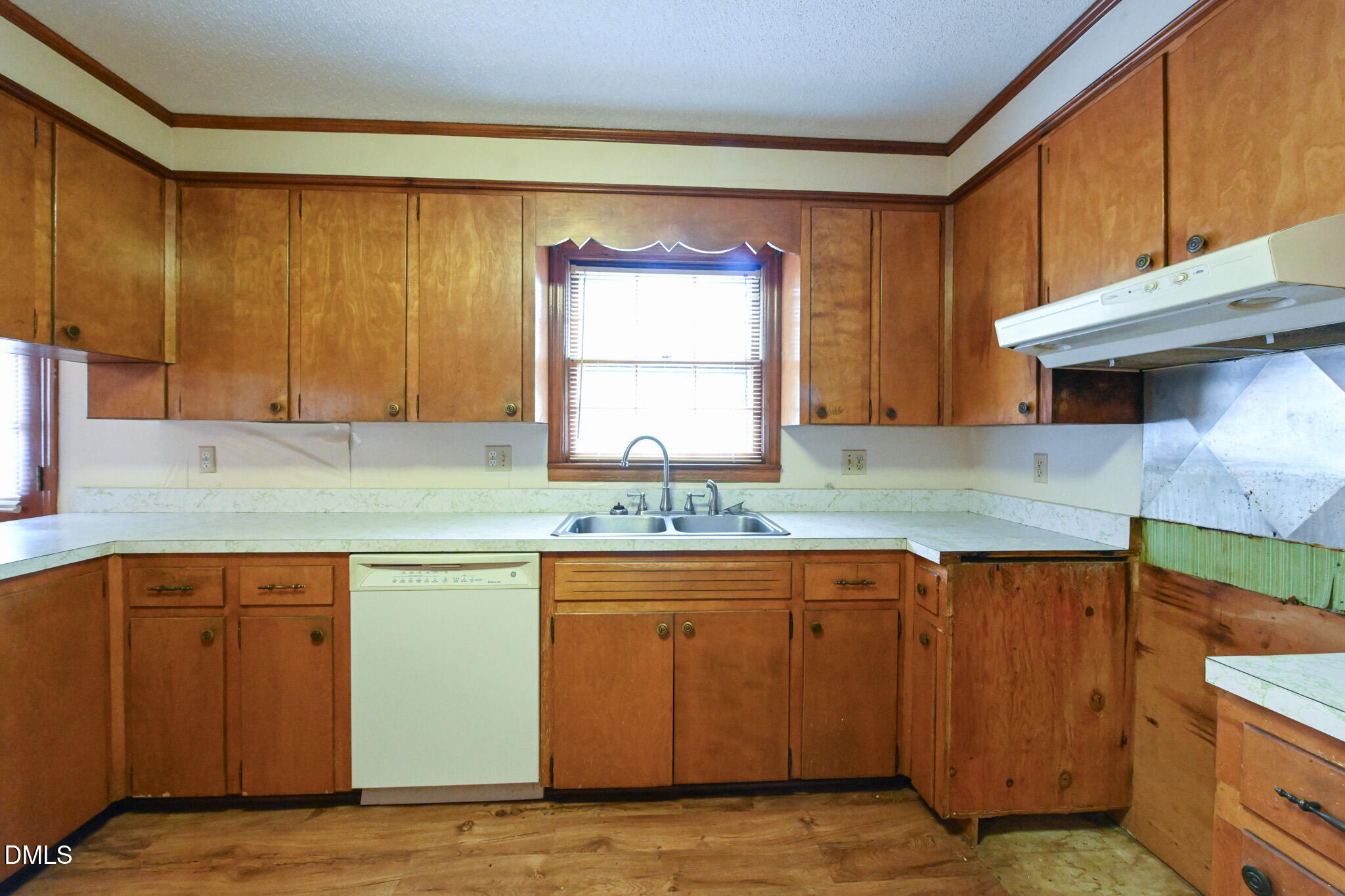 3011 Will Lucas Road Linden, NC 28356 - Photo 13 of 35 a kitchen with stainless steel appliances granite countertop a sink and cabinets