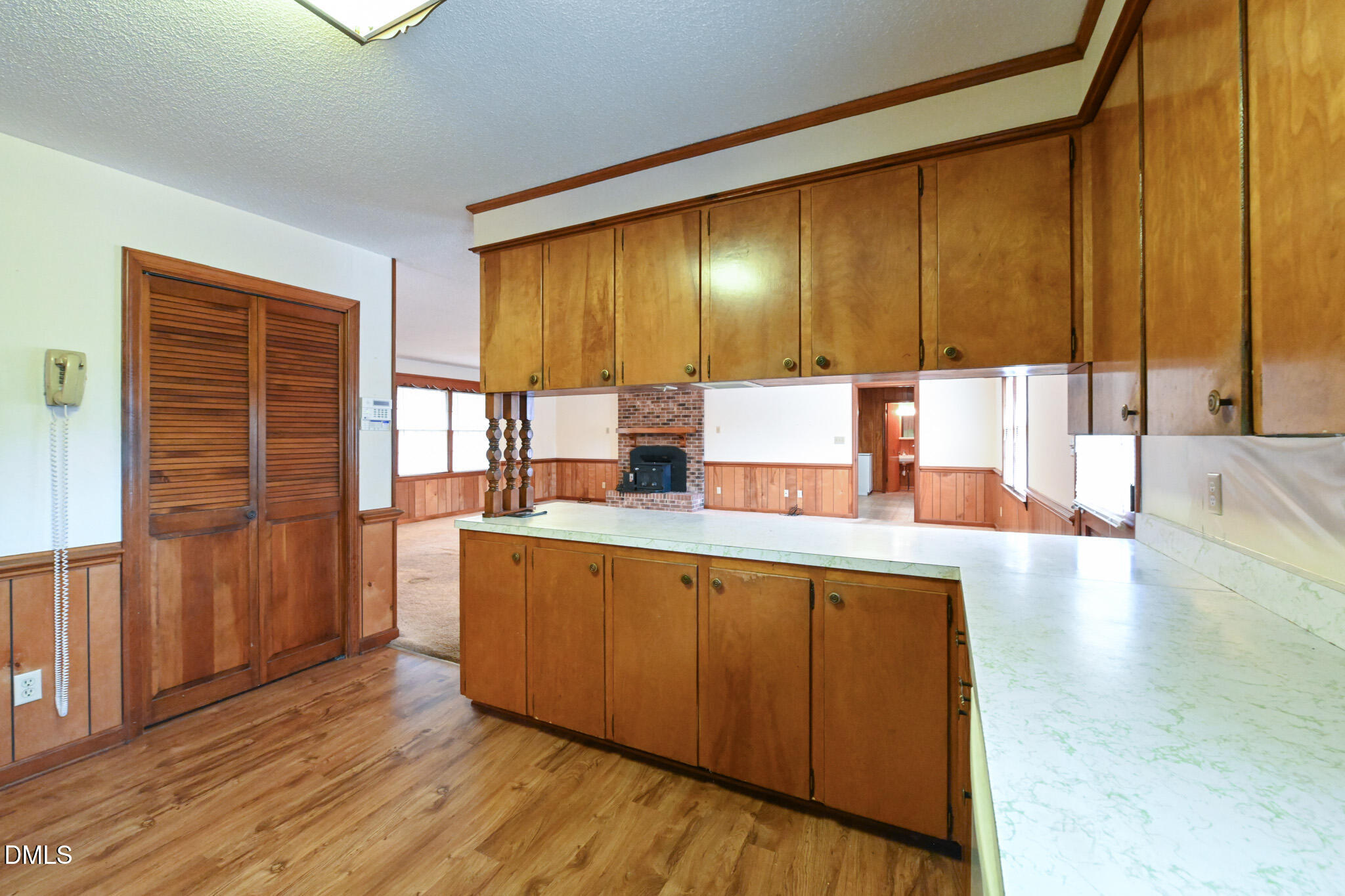 3011 Will Lucas Road Linden, NC 28356 - Photo 14 of 35 a large kitchen with stainless steel appliances wooden floor and a large window