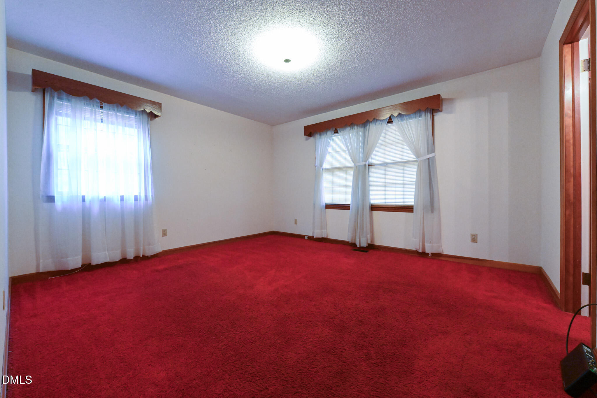 3011 Will Lucas Road Linden, NC 28356 - Photo 15 of 35 an empty room with windows