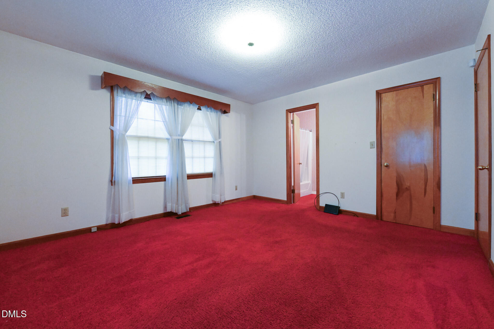 3011 Will Lucas Road Linden, NC 28356 - Photo 16 of 35 an empty room with windows