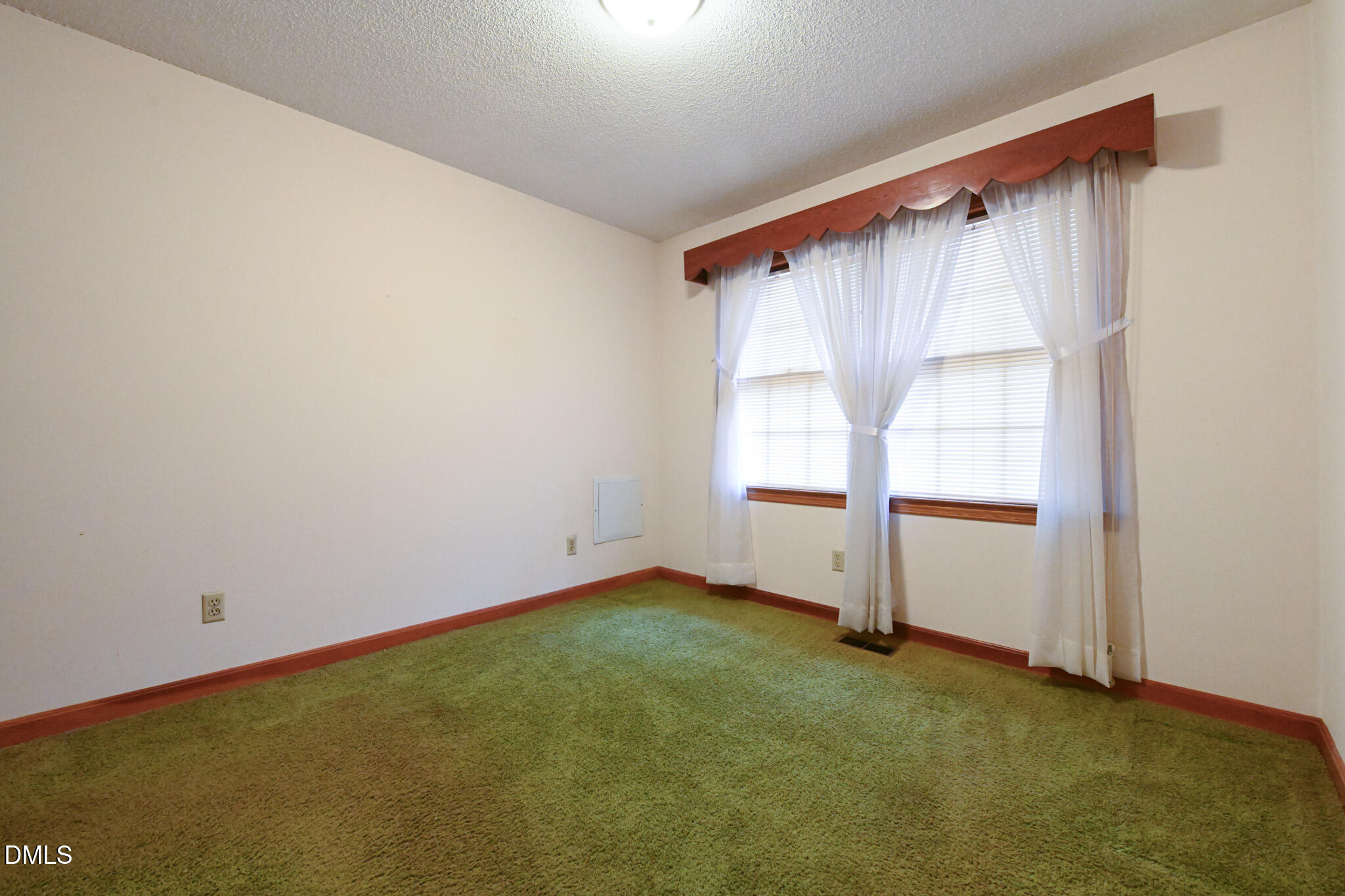 3011 Will Lucas Road Linden, NC 28356 - Photo 20 of 35 an empty room with a window