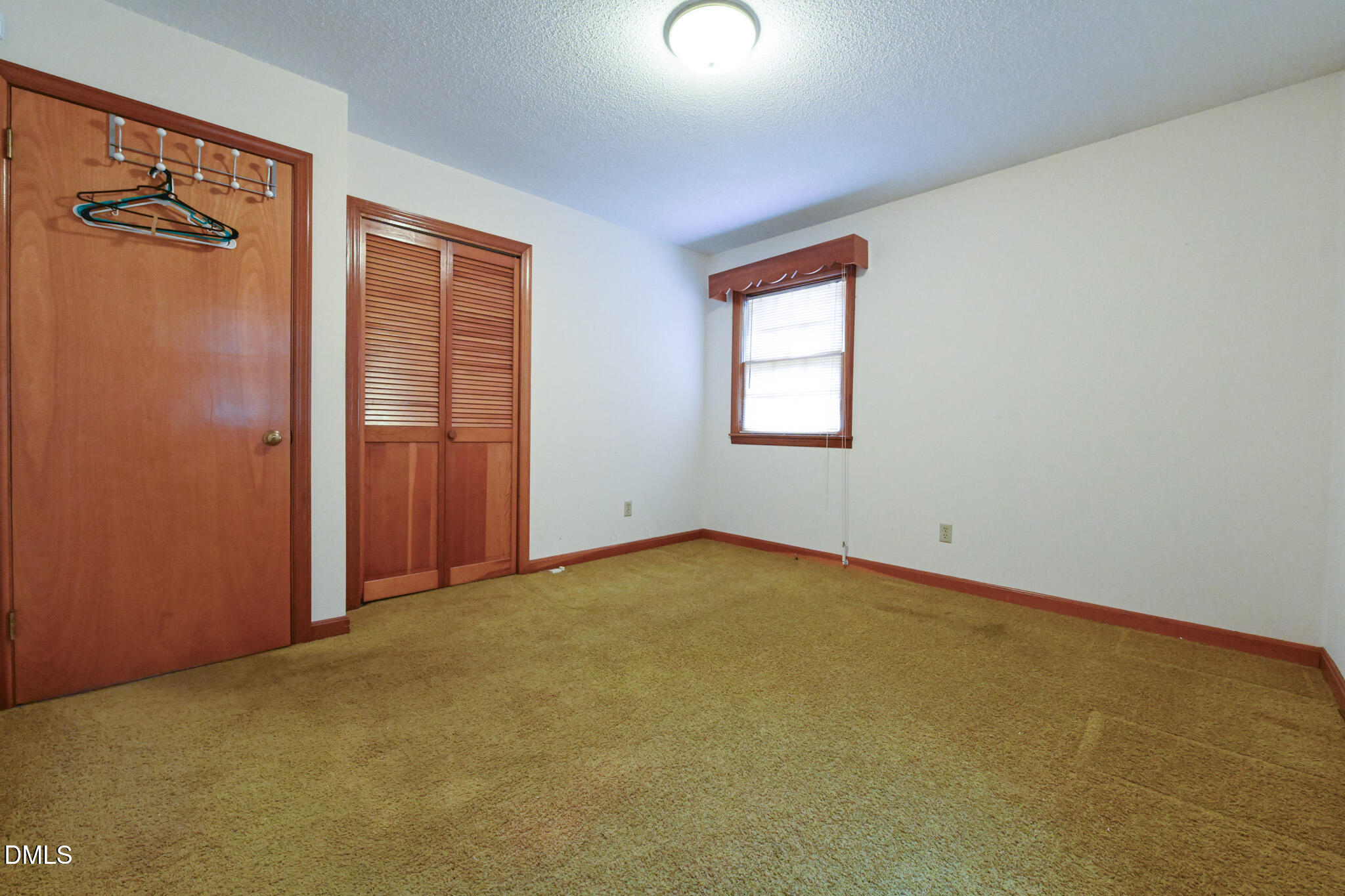 3011 Will Lucas Road Linden, NC 28356 - Photo 25 of 35 an empty room with windows and closet
