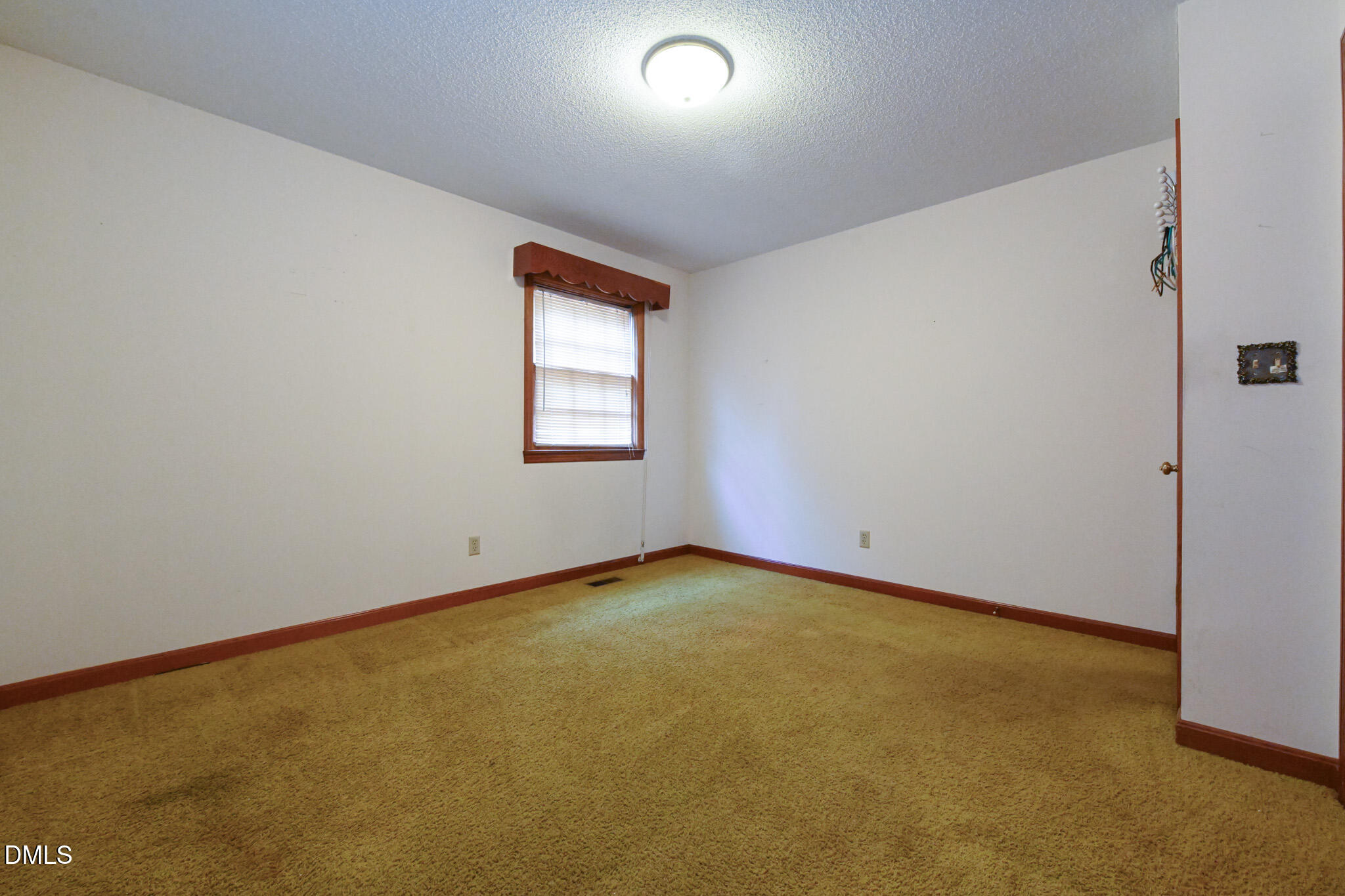 3011 Will Lucas Road Linden, NC 28356 - Photo 26 of 35 an empty room with a empty space and windows
