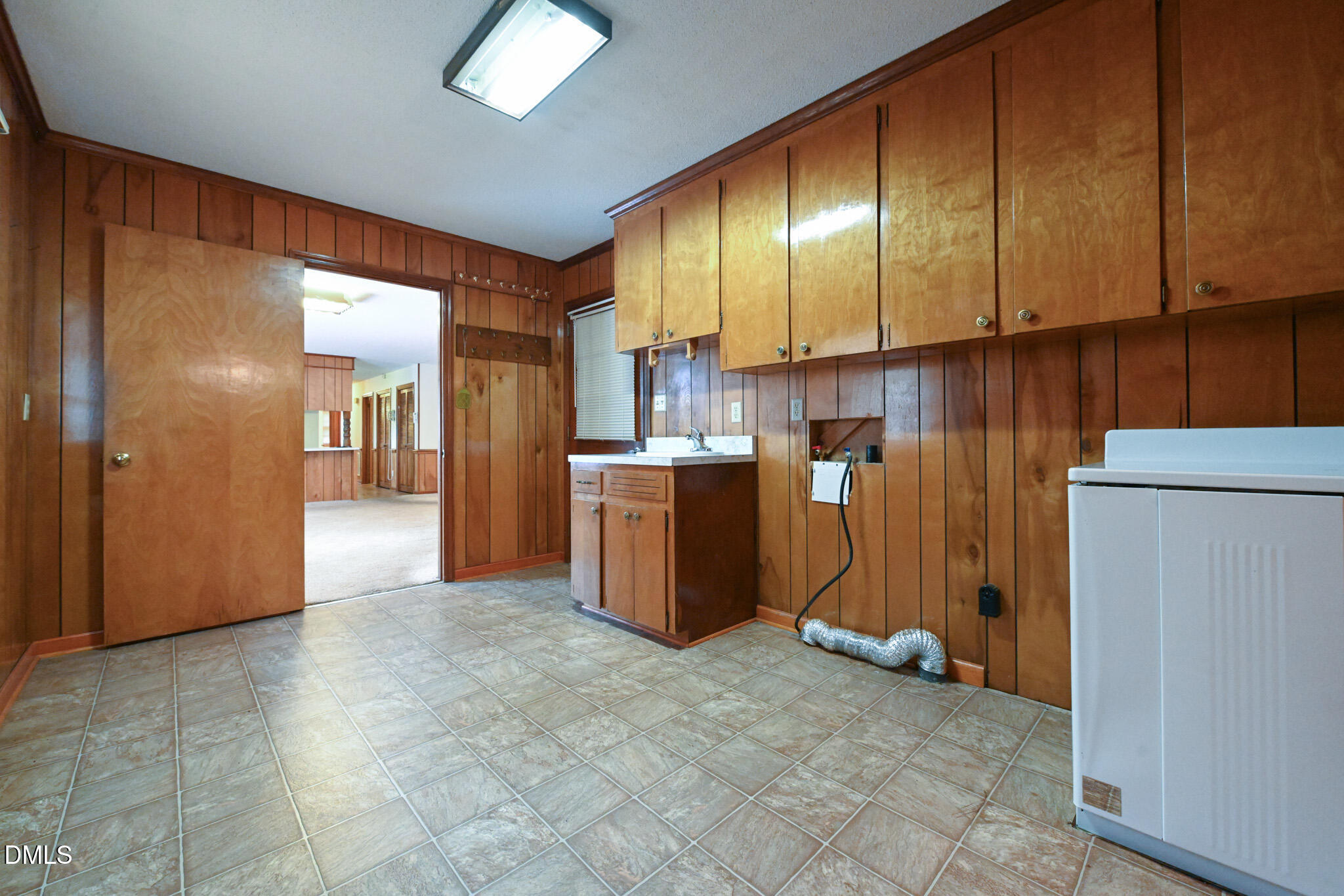 3011 Will Lucas Road Linden, NC 28356 - Photo 28 of 35 a view of a kitchen with furniture and an empty room