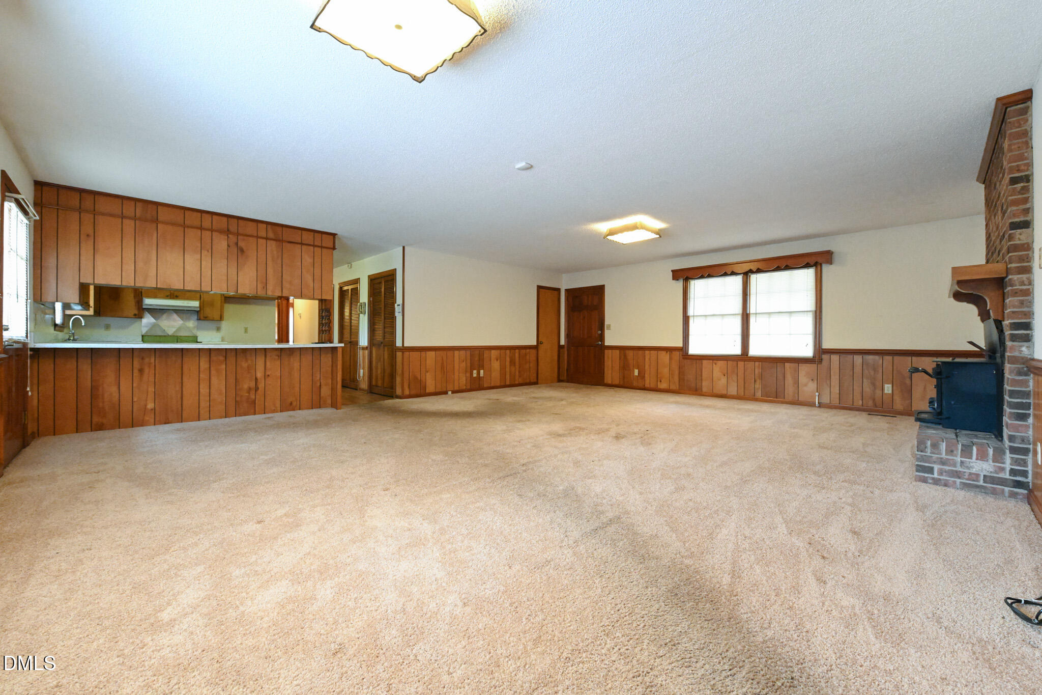 3011 Will Lucas Road Linden, NC 28356 - Photo 9 of 35 a view of an empty room with a window and cabinet